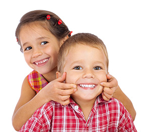 Boy and girl smiling happily