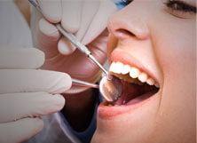 Young woman smiling during emergency dental exam